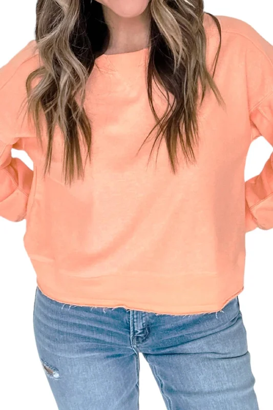 Raw Edge Knit Pullover Top In Orange